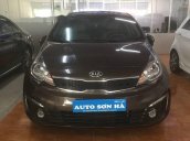 Bán xe Kia Rio 1.4 AT năm sản xuất 2015, màu nâu