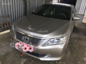 Bán xe Toyota Camry sản xuất 2014 màu vàng, 788 triệu