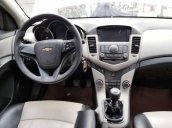 Bán ô tô Chevrolet Cruze 1.6MT đời 2015, màu trắng xe gia đình