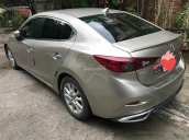 Bán xe Mazda 3 năm 2016 màu vàng cát, 599 triệu