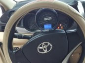 Bán Toyota Vios E 1.5MT màu vàng cát, số sàn, sản xuất 2017, biển Sài Gòn, lăn bánh 23000km