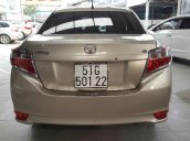 Bán Toyota Vios E 1.5MT màu vàng cát, số sàn, sản xuất 2017, biển Sài Gòn, lăn bánh 23000km