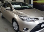 Bán Toyota Vios E 1.5MT màu vàng cát, số sàn, sản xuất 2017, biển Sài Gòn, lăn bánh 23000km