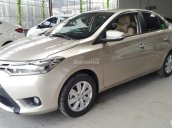 Bán Toyota Vios E 1.5MT màu vàng cát, số sàn, sản xuất 2017, biển Sài Gòn, lăn bánh 23000km