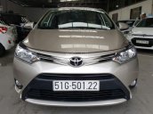 Bán Toyota Vios E 1.5MT màu vàng cát, số sàn, sản xuất 2017, biển Sài Gòn, lăn bánh 23000km