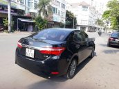 Bán xe cũ Toyota Corolla altis đời 2015, màu đen