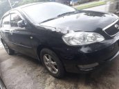 Cần bán lại xe Toyota Corolla altis đời 2003, màu đen, giá 230tr