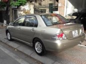 Bán xe Mitsubishi Lancer năm sản xuất 2004, màu vàng, 230tr