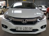 Bán Honda City TOP 1.5CVT màu trắng, số tự động vô cấp sản xuất cuối 2017, biển Bình Dương, lăn bánh 14000km