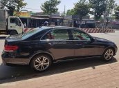 Bán Mercedes E250 đời 2014, màu đen còn mới