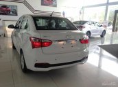 Hỗ trợ mua xe trả góp lên đến 80% giá trị xe khi mua chiếc Hyundai Grand i10 sedan 1.2 MT base, sản xuất 2018, màu trắng