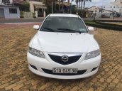 Cần bán gấp Mazda 6 MT đời 2004, màu trắng 