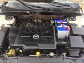 Cần bán gấp Mazda 6 MT đời 2004, màu trắng 