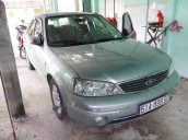 Cần bán gấp Ford Laser năm sản xuất 2004, màu bạc