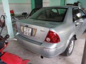 Cần bán gấp Ford Laser năm sản xuất 2004, màu bạc