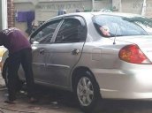 Bán xe Kia Spectra đời 2004, màu bạc, giá 125tr