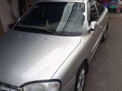 Bán xe Kia Spectra đời 2004, màu bạc, giá 125tr