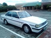 Bán ô tô Nissan Bluebird MT sản xuất năm 1996, màu trắng, nội thất bọc mới