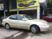 Cần bán gấp Daewoo Leganza 1997, màu vàng số sàn