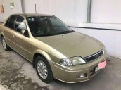 Cần bán gấp Ford Laser sản xuất 2002, màu vàng còn mới