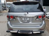 Bán Toyota Fortuner G 2.5MT, màu bạc, máy dầu, số sàn, sản xuất 2015, biển Sài Gòn, lăn bánh 58000km