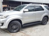 Bán Toyota Fortuner G 2.5MT, màu bạc, máy dầu, số sàn, sản xuất 2015, biển Sài Gòn, lăn bánh 58000km