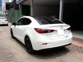 Cần bán xe Mazda 3 1.5 SD AT cũ đời 2015, màu trắng, xe đi ít, mới 90%