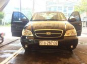 Cần bán gấp Kia Carnival năm sản xuất 2009, màu đen 