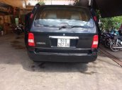 Cần bán gấp Kia Carnival năm sản xuất 2009, màu đen 