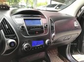 Bán xe Hyundai Tucson 2.0AT 4WD đời 2011, màu đen, 585 triệu