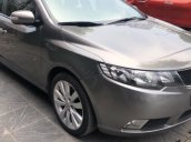 Bán xe Kia Cerato 1.6 AT 2010, màu xám, xe nhập