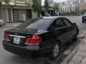 Cần bán lại xe Toyota Camry 2.4G đời 2005, màu đen, giá tốt