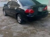 Bán ô tô Toyota Corolla altis 1.3 đời 2002, màu đen chính chủ