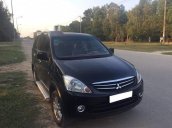 Cần bán xe Mitsubishi Zinger đời 2010, màu đen số tự động