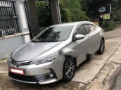 Cần bán Toyota Corolla altis 1.8G đời 2017, màu bạc như mới