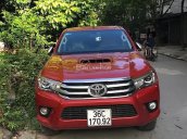 Bán ô tô Toyota Hilux 3.0G 4x4 AT sản xuất 2016, màu đỏ, xe nhập