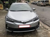 Cần bán Toyota Corolla altis 1.8G đời 2017, màu bạc như mới