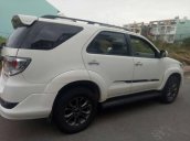 Bán xe Toyota Fortuner đời 2014, màu trắng số tự động