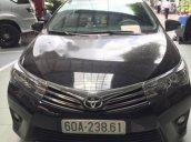 Cần bán Toyota Corolla Altis 1.8 AT 2015, odo 72.000km, màu đen, đủ đồ chơi