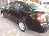 Gia đình bán xe Lacetti SX sản xuất 2011, màu đen 2011