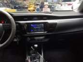 Cần bán Toyota Corolla Altis 1.8 AT 2015, odo 72.000km, màu đen, đủ đồ chơi