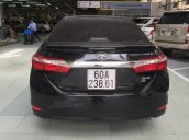 Cần bán Toyota Corolla Altis 1.8 AT 2015, odo 72.000km, màu đen, đủ đồ chơi