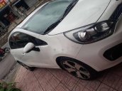 Bán chiếc Kia Rio Hatchback 5 cửa, màu trắng, đăng ký lần đầu 04/2013