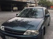 Cần bán gấp Ford Laser Lx đời 2011, màu xanh lam