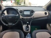 Cần bán Hyundai Grand i10 1.0AT đời 2016, màu trắng