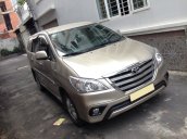 Cần bán xe Toyota Innova 2.0G AT 2014 màu vàng cát, odo 56.000 km