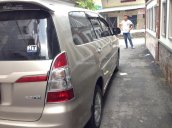 Cần bán xe Toyota Innova 2.0G AT 2014 màu vàng cát, odo 56.000 km