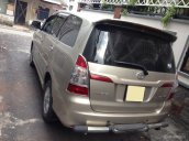 Cần bán xe Toyota Innova 2.0G AT 2014 màu vàng cát, odo 56.000 km