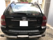 Cần bán xe gấp Sportage MT 2006, máy dầu, màu đen nhập Korea