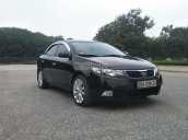 Cần bán xe Kia Forte AT đời 2011, màu đen, giá chỉ 410 triệu